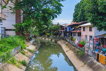 Fototapeta premium Riverside houses view in Thailand