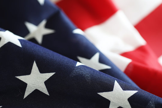 American Flag On A Wooden Texture Table