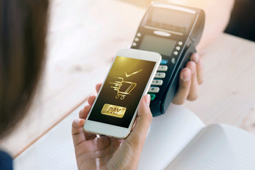 Mobile Payment with NFC technology  on Smartphone shopping online with filter effect.