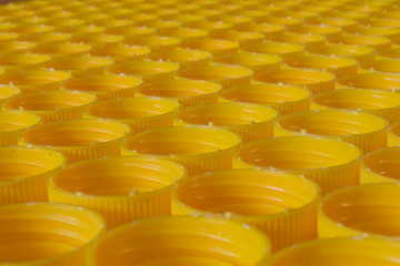 yellow plastic caps