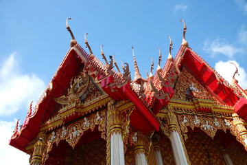 Buddhist temple among clear sky.