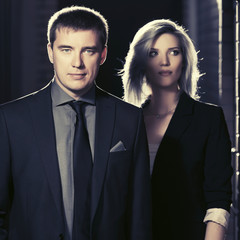 Young fashion business couple at office building