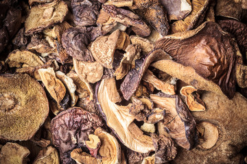 Dry mushrooms as food background