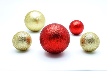 Gold and Red ball ornament on white background
