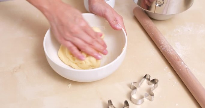 Mixing dough in bowl