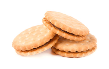 Sandwich biscuits, filled with chocolate. Cookies with cream filling isolated on white background.