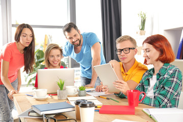 Group of young students studying indoors