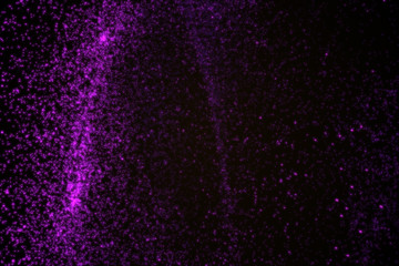 Abstract background made of violet glowing particles