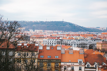 View from a high point. A beautiful view from above on the streets, roads and roofs of houses in...