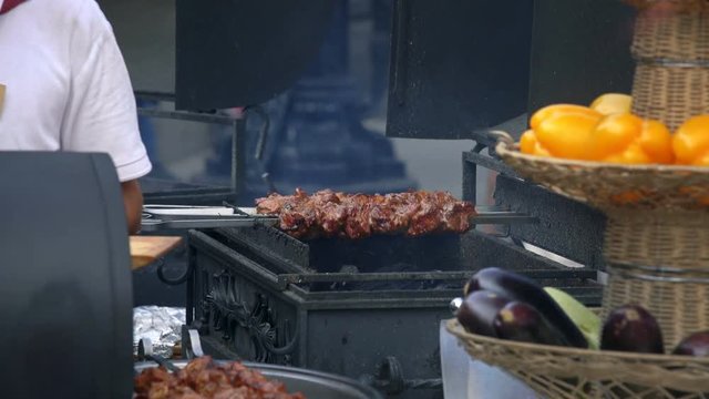 MOSCOW, RUSSIA, JULE 24, 2016: Pork Skewers Turning Automatically On Grill