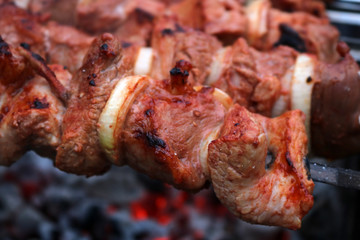 Grill meat barbeque on fire.