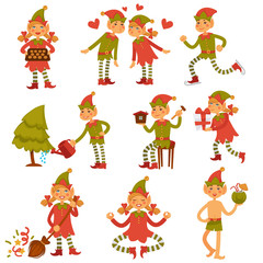 Obraz na płótnie Canvas Christmas male and female elves in festive clothes