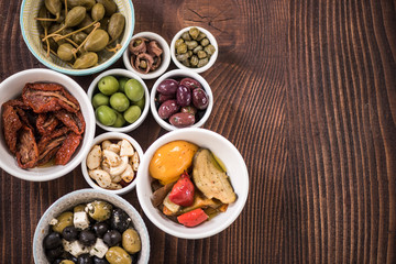 Selection of tapas in ceramic bowls