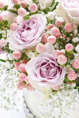 Bouquet of flowers with pink roses and hypericum coco casino.