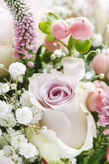 Bouquet of flowers with pink roses and hypericum coco casino.