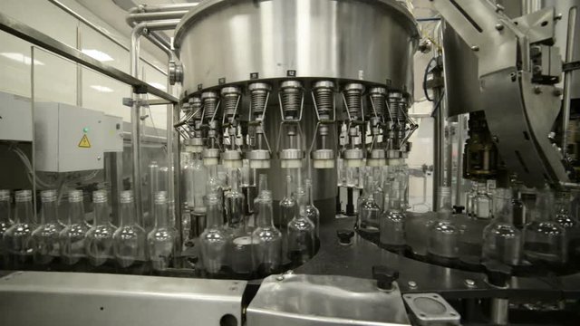 Automatic line of bottling of alcoholic beverages.