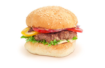 Hamburger with beef patty and vegetables on a white background