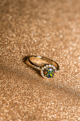 Fototapeta na wymiar Gold Ring with Green Opal