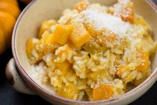 Close-up of a bowl with pumpkin risotto, selective focus, shallow depth of field