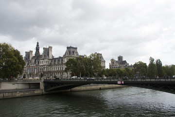 Fototapeta na wymiar View landscape of Paris city at riverside of Seine river and Hotel de Ville with traffic road