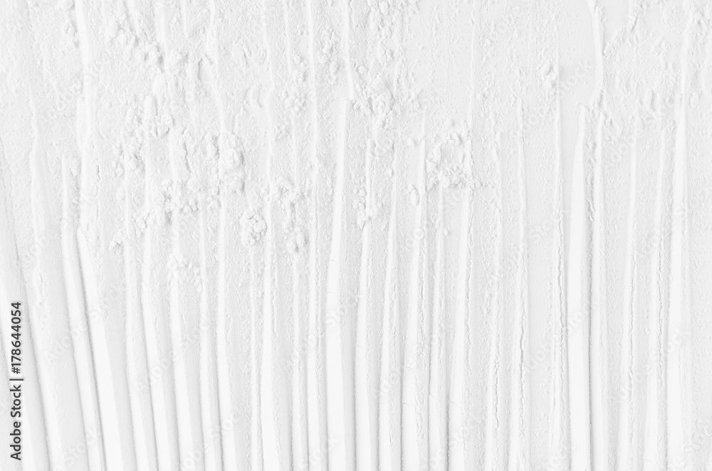 Poster white abstract striped soft smooth crumbly plaster background with vertical folds.