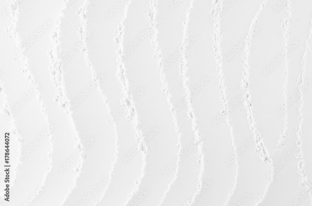 Poster white abstract soft smooth crumbly plaster background with vertical curved waves.