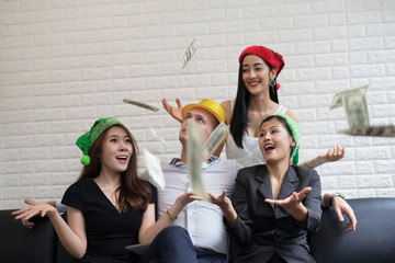 Happy business group people in santa hat having fun for celebrity christmas party.