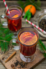 Hot spiced drink from infused tea with rum and mandarin
