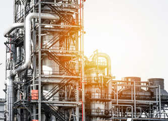 Industrial zone,The equipment of oil refining,Close-up of industrial pipelines of an oil-refinery plant,Detail of oil pipeline with valves in large oil refinery.