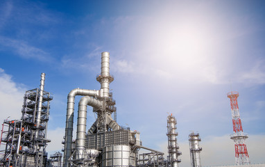 Fototapeta premium Industrial zone,The equipment of oil refining,Close-up of industrial pipelines of an oil-refinery plant,Detail of oil pipeline with valves in large oil refinery.