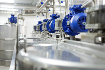 Large steel tanks, Shop location.