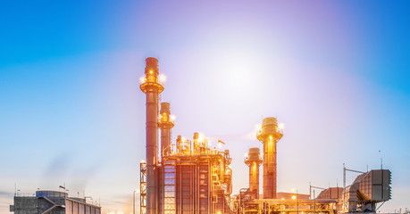 Obraz premium Industrial zone,The equipment of oil refining,Close-up of industrial pipelines of an oil-refinery plant,Detail of oil pipeline with valves in large oil refinery.