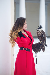 Beautiful woman with a falcon