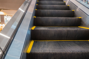 The modern Escalators Building interior  in shopping mall.