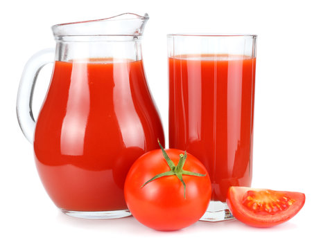 Tomato juice in glass jug isolated on white background © Dmytro