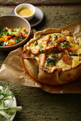 Fresh quiche with salmon and spinach