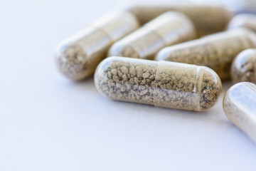 Closeup pills, capsule on white background.  Medical and health care concept.
