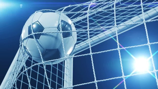 Beautiful Soccer Slow Motion Concept of the Ball flying into Goal Net. Fans taking pictures with flashes. 3d animation Close up of the Goal Moment. 4k UHD 3840x2160.