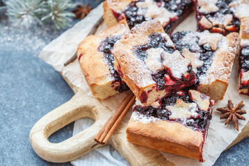 Sweet Christmas berry pie in Christmas decorations