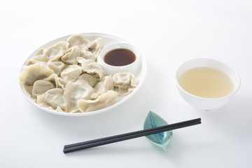 Chinese food JIAOZI on white background. 