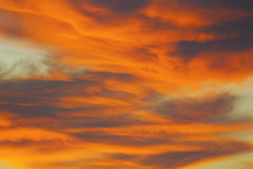 Fototapeta na wymiar beautiful bright orange clouds in the early morning