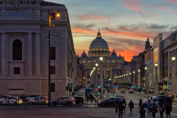 Saint Peter Vatican city at sunset - Rome , Italy 