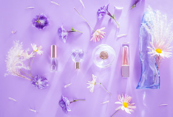 Bottles of perfume with flowers
