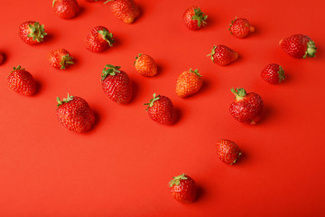 Strawberries red background