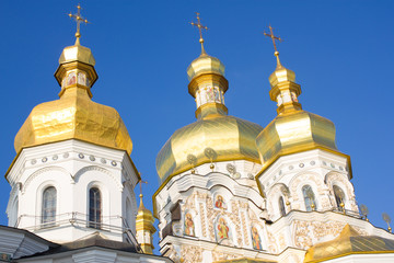 Fototapeta na wymiar Golden domes of the church in Kiev-Pechersk Lavra, ancient Christian monastery in Kiev, Ukraine