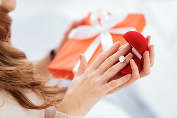 Young lady trying on diamond ring