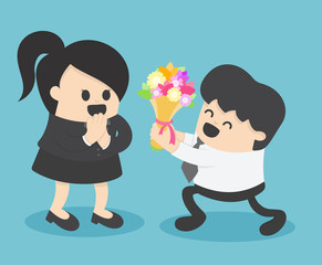 Obraz na płótnie Canvas businessman giving flower to businesswoman