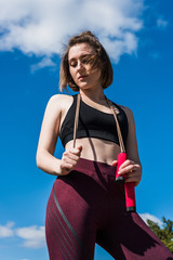 sportive woman with jumping rope