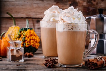 Pumpkin spice latte with whipped cream and cinnamon