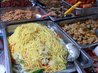 Fried yellow noddle for sell during Vegetarian festival at Saphan Khwai, Bangkok, Thailand